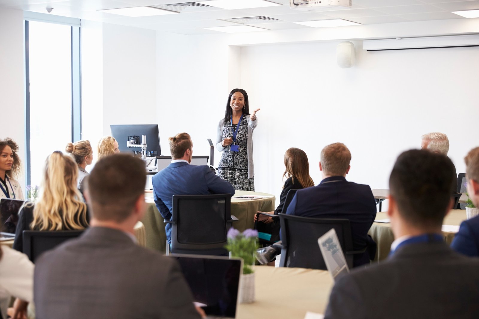 Businesswoman Making Presentation At Conference